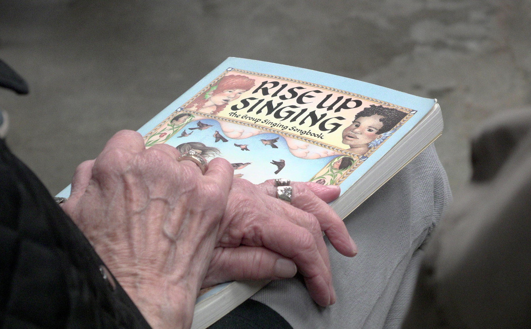 A songbook lies on a member of the River Rats’ lap